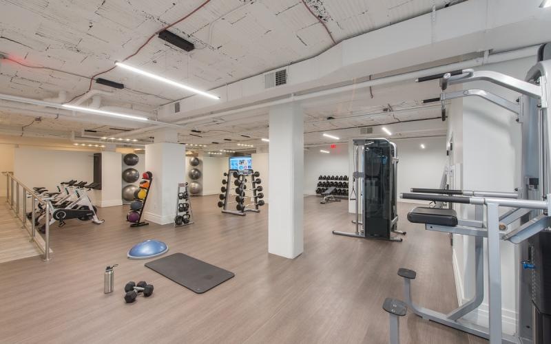 a large room with exercise equipment